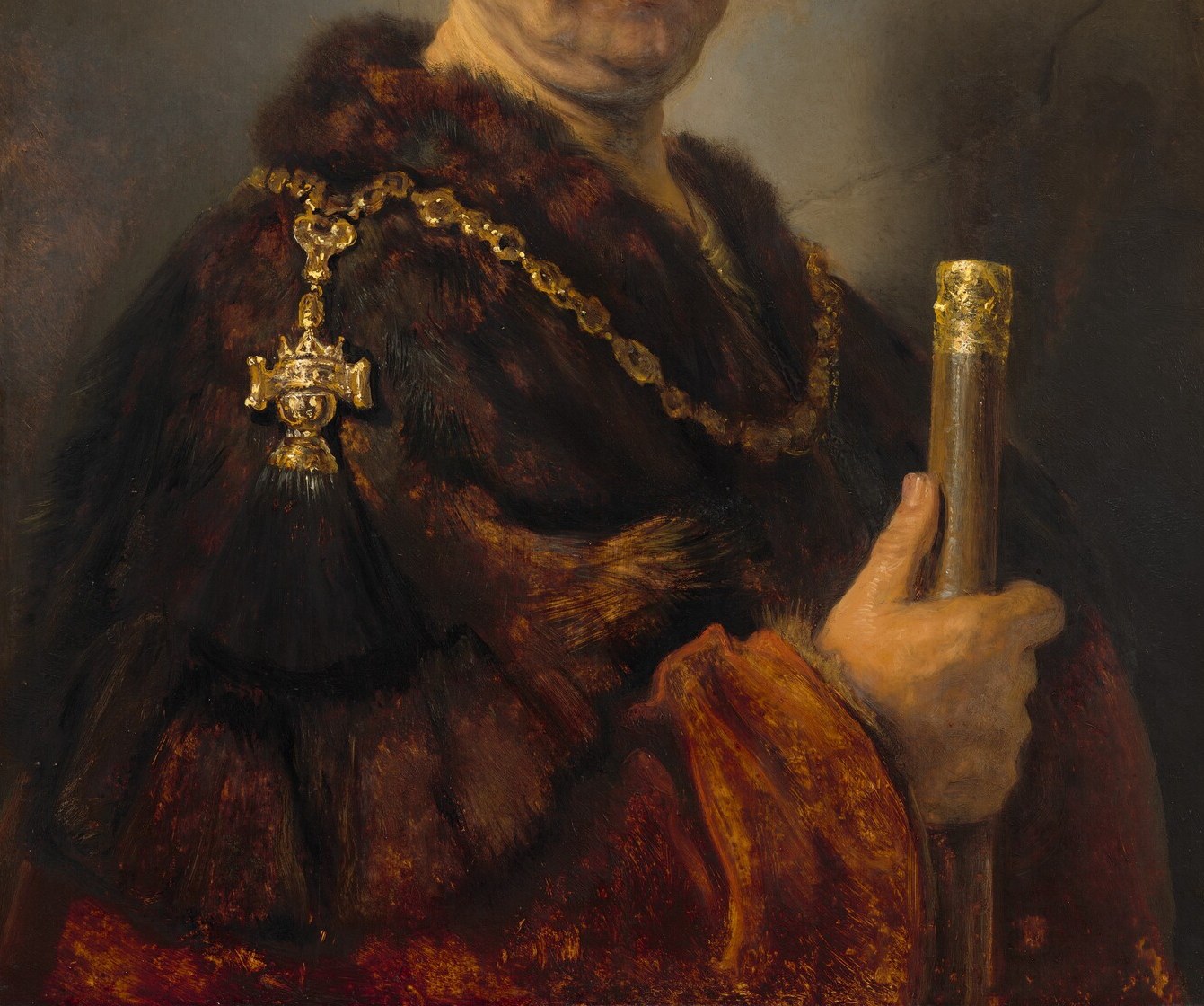The warm earth-toned fabric with fur edging is rendered in loaded impasto , Rembrandt differentiates silk from fur from velvet with brushwork alone, no outlines.