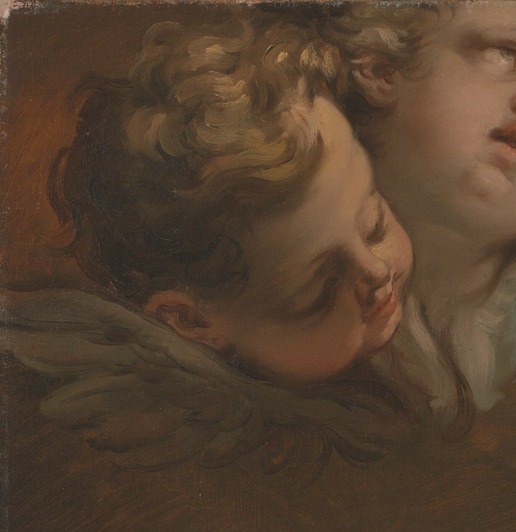 Look for the two angel heads watching from the dark.