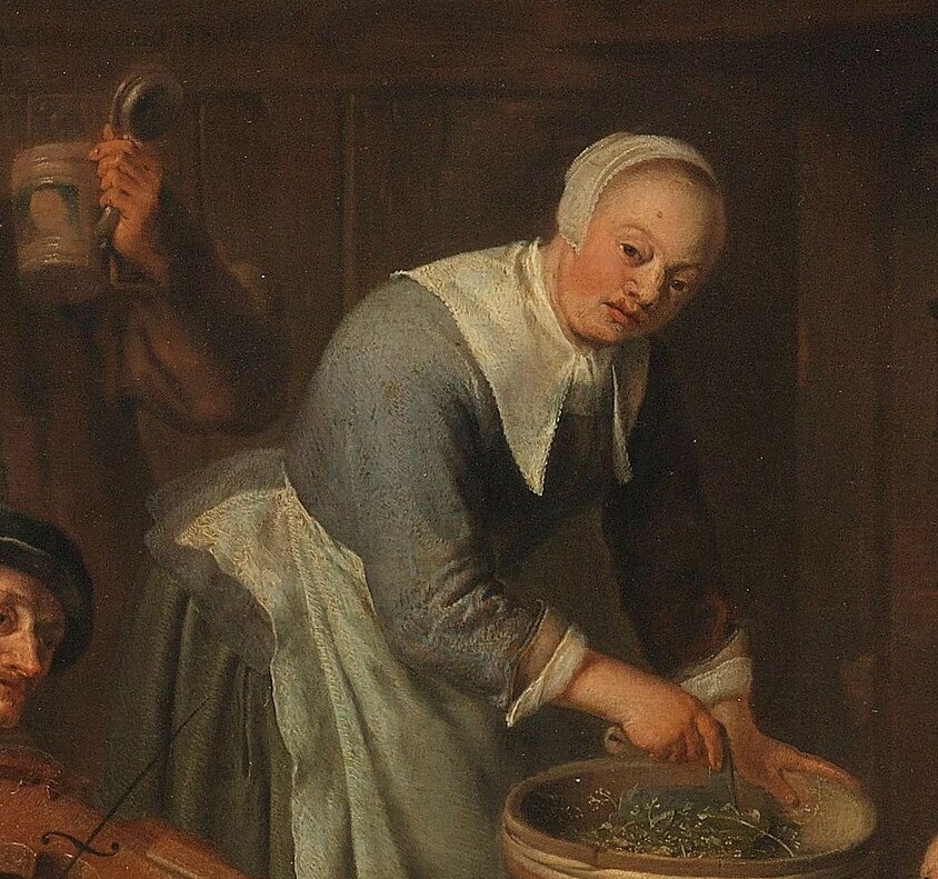 But life continues, like this woman preparing food.