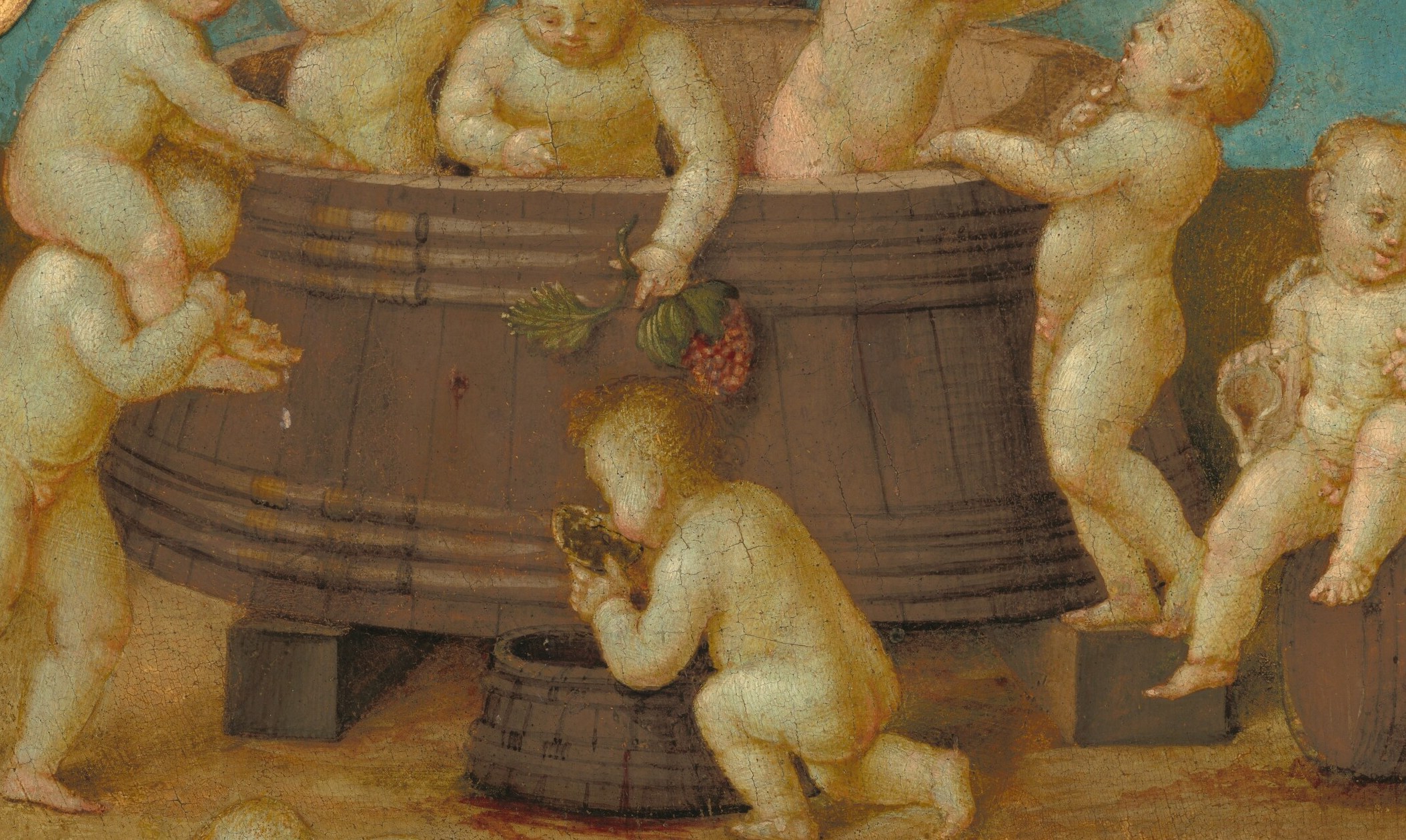 The central element of the scene, showing the activity of winemaking and providing a stage for the putti.