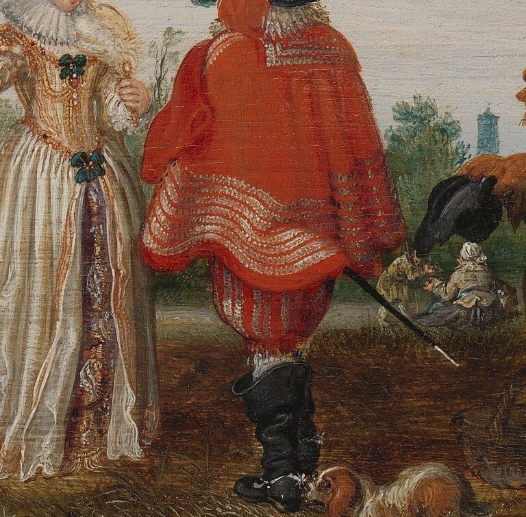 See the man in the bright red coat watching.