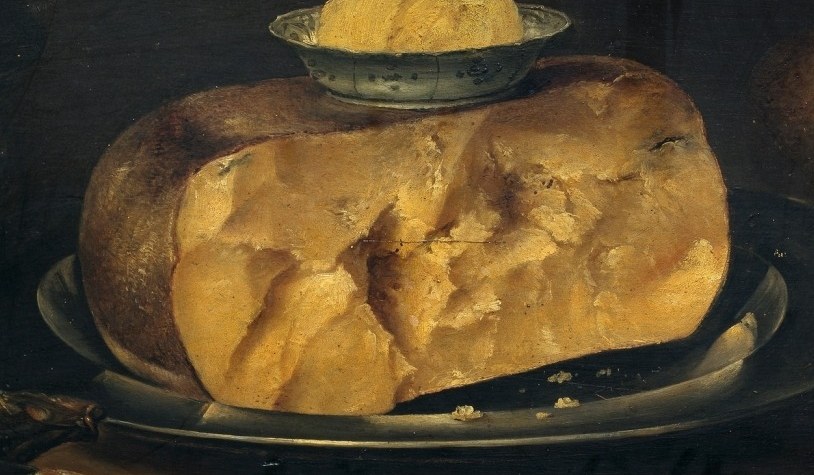 There is bread, cheese, and fish.