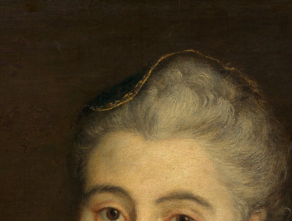 The powdered hair: she follows the king's fashion.