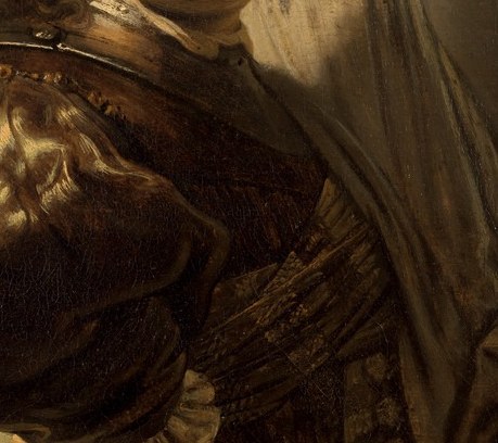 Look at the ornate armor and plumed hat.
