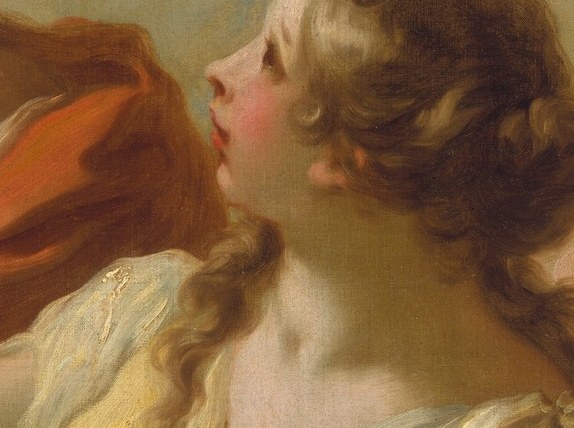 Her face, upturned, shows pure surprise.