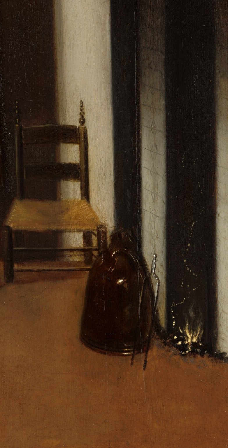 That empty chair pulls the room into a story.