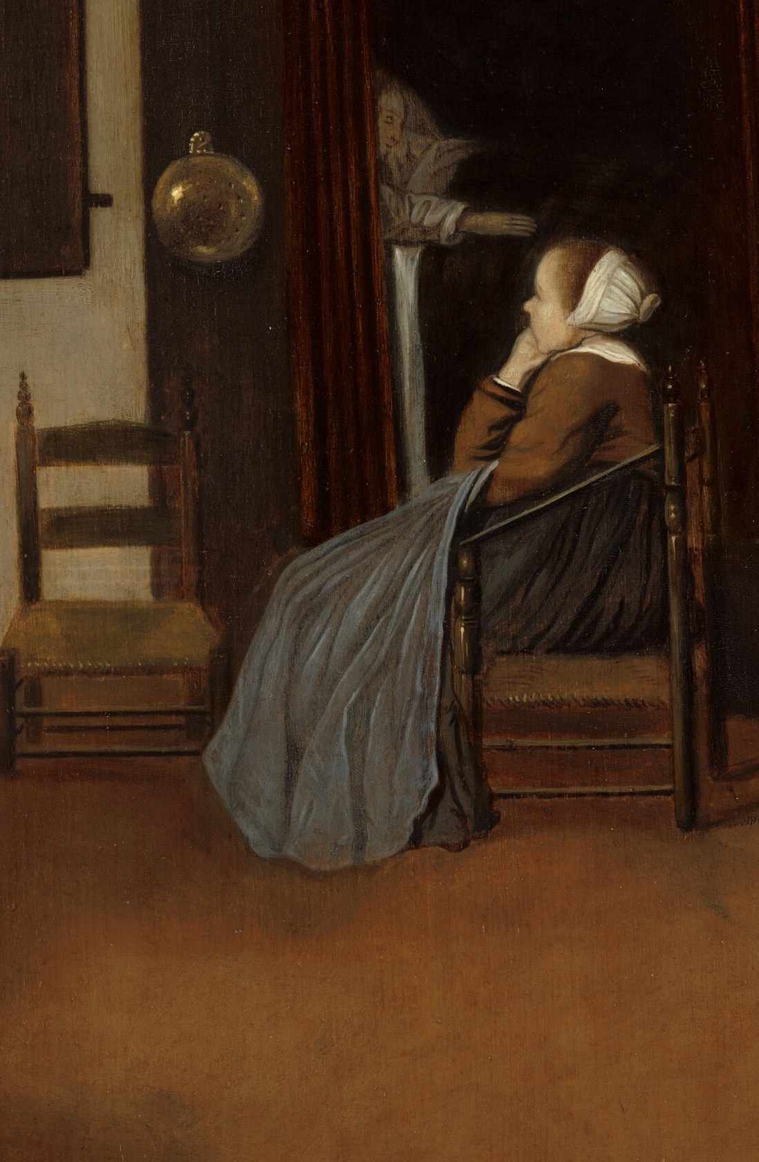 Every object in the room reinforces her stillness.