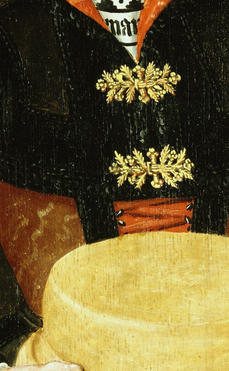 Her red and black garments show the fashion of her time.