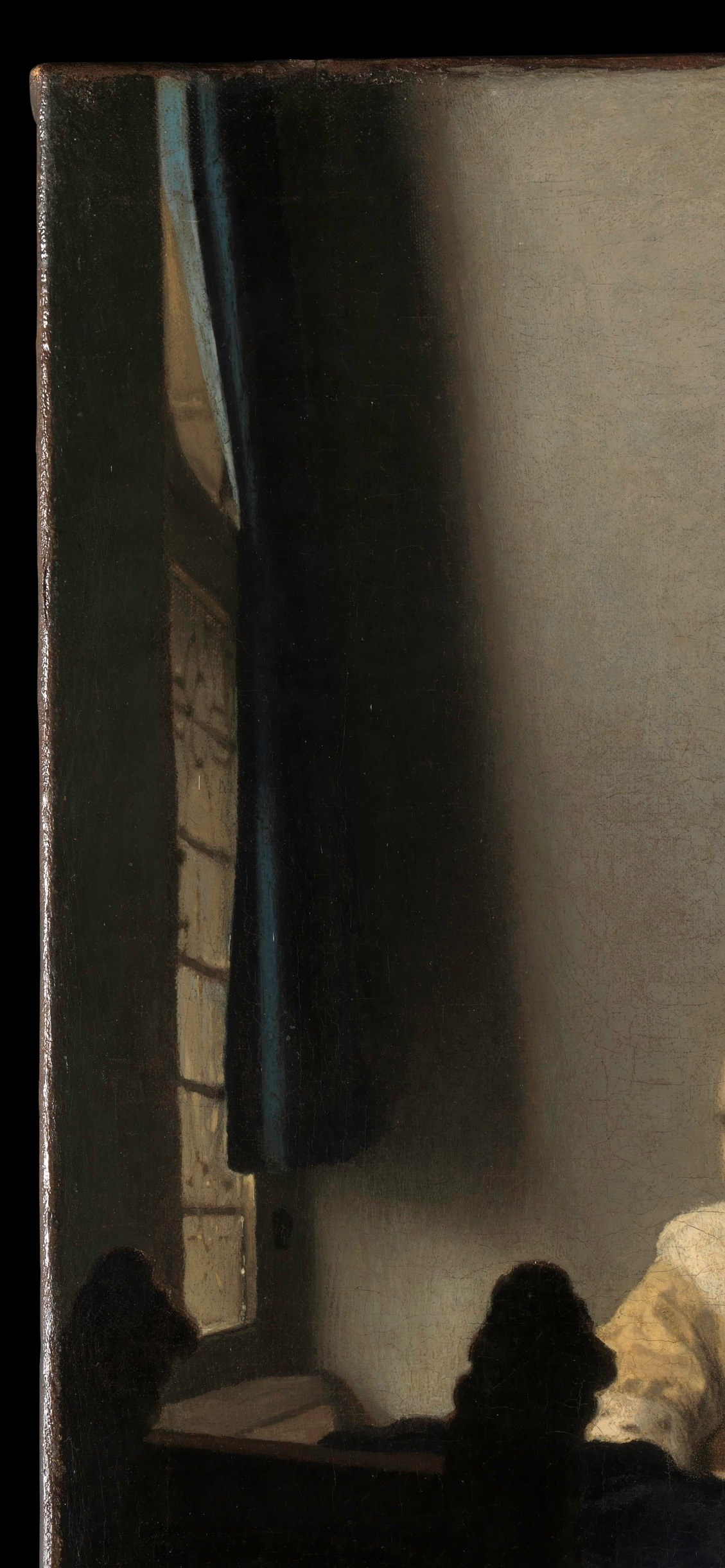 Vermeer's signature light engine; the translucent and partially open panes create the layered light-filtering effect that makes everything else in the room glow softly