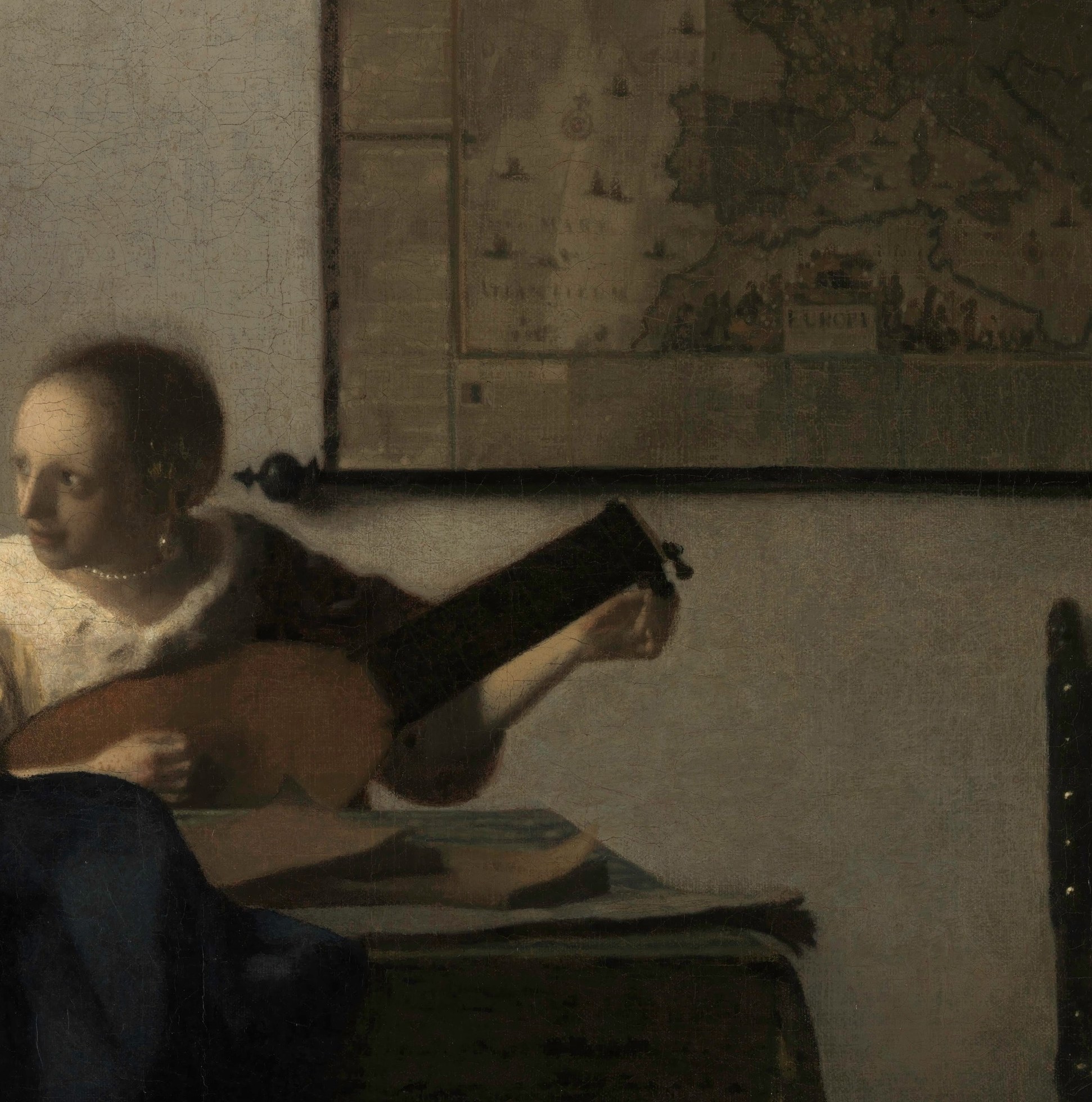 Tuning a lute was a recognized 17th-century emblem of temperance; the instrument is the painting's primary symbolic object and the source of its title