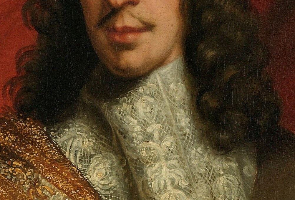 The intricate detail and crisp white of the collar contrast with the darker tones of his attire, highlighting his status.