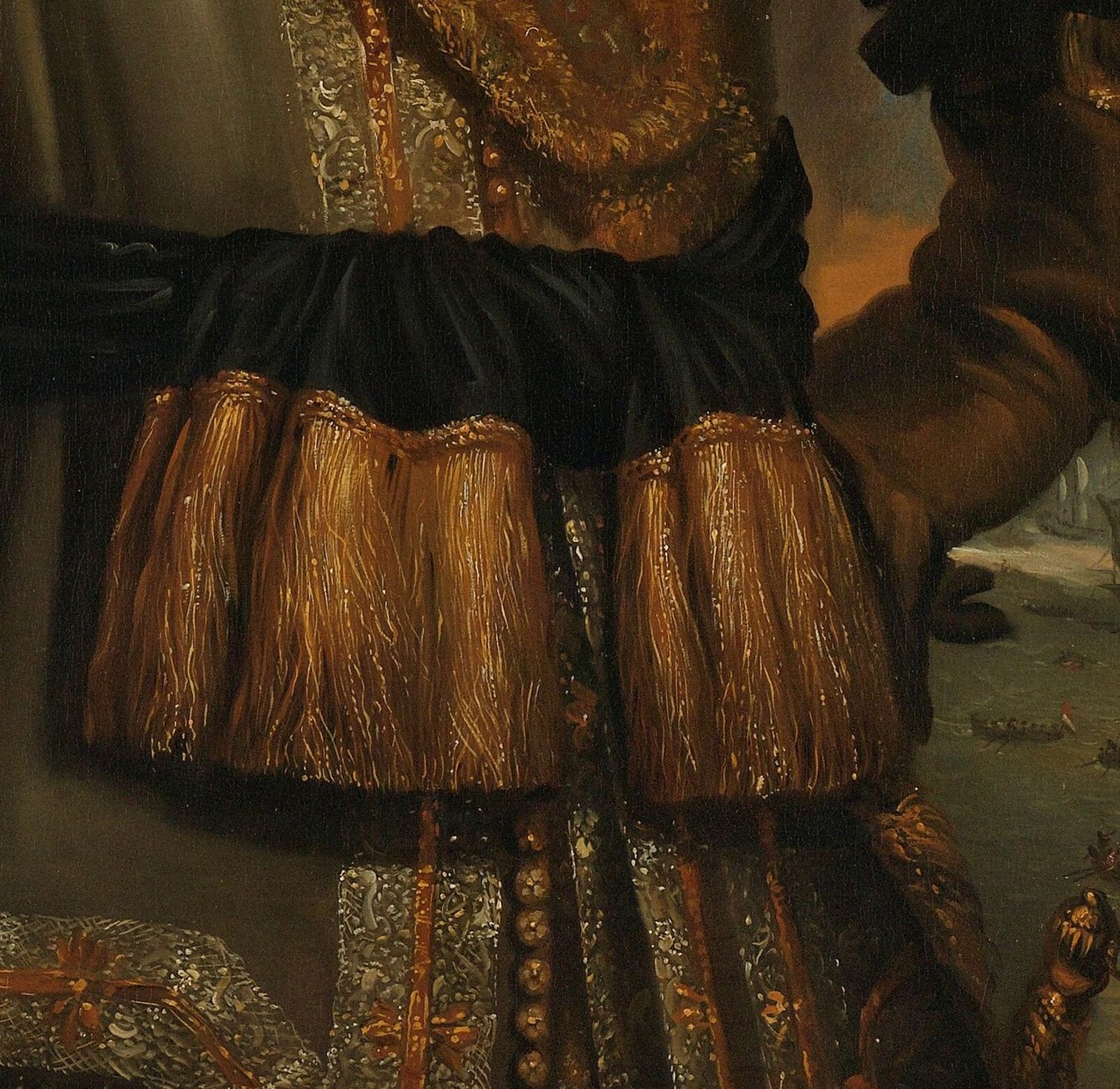 The elaborate tassels and patterned fabric of his lower garment add to the overall impression of opulence.