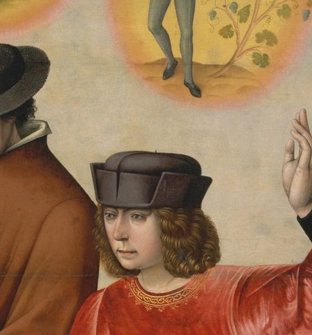Alert, composed expression contrasts with the anxiety implied in the scene; identifies Joseph as the interpreter, not the dreamer