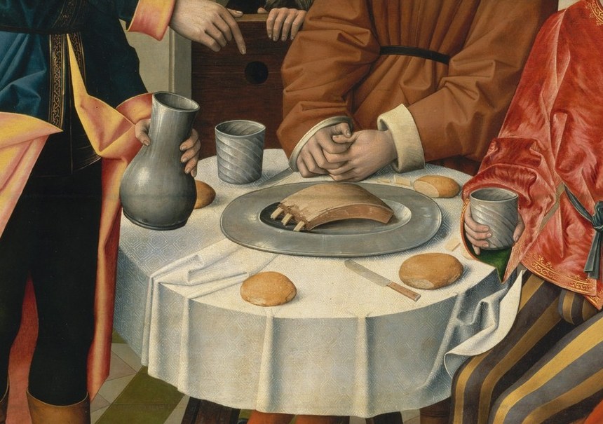Laden table in a prison scene is an incongruous detail , possibly echoing the baker's dream of bread, or showing the relative comfort of Pharaoh's imprisoned officers