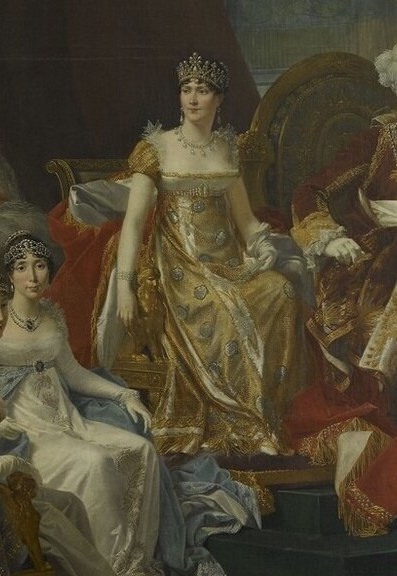 Her regal attire and seated pose indicate her importance as the bride and future queen.