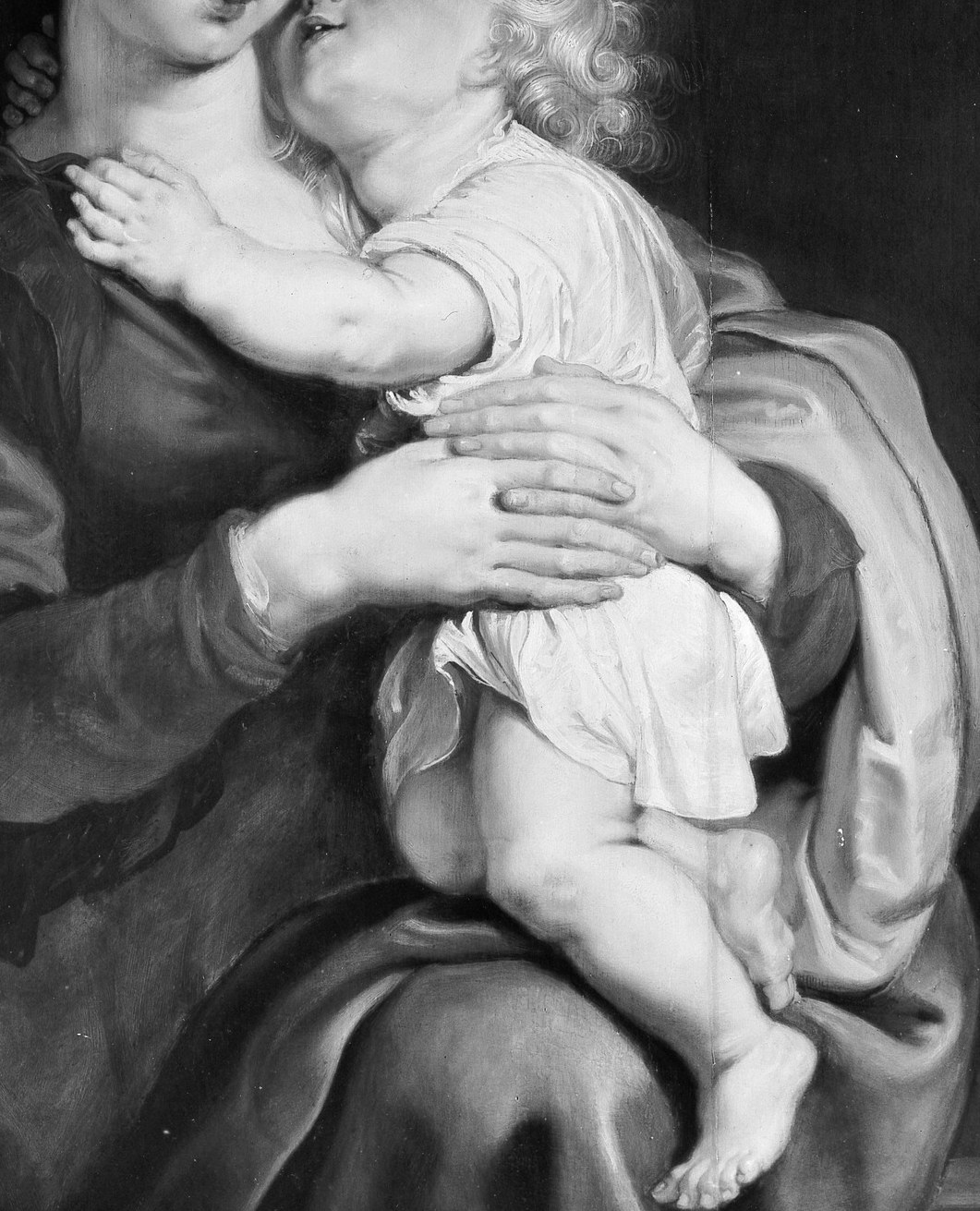 His whole body is soft, real infant weight. No symbol, just a child.