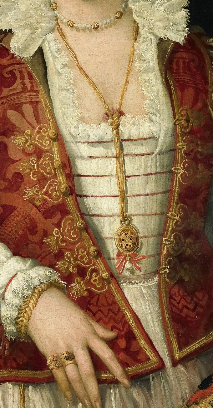 The woman wears the finest 16th-century fashion.