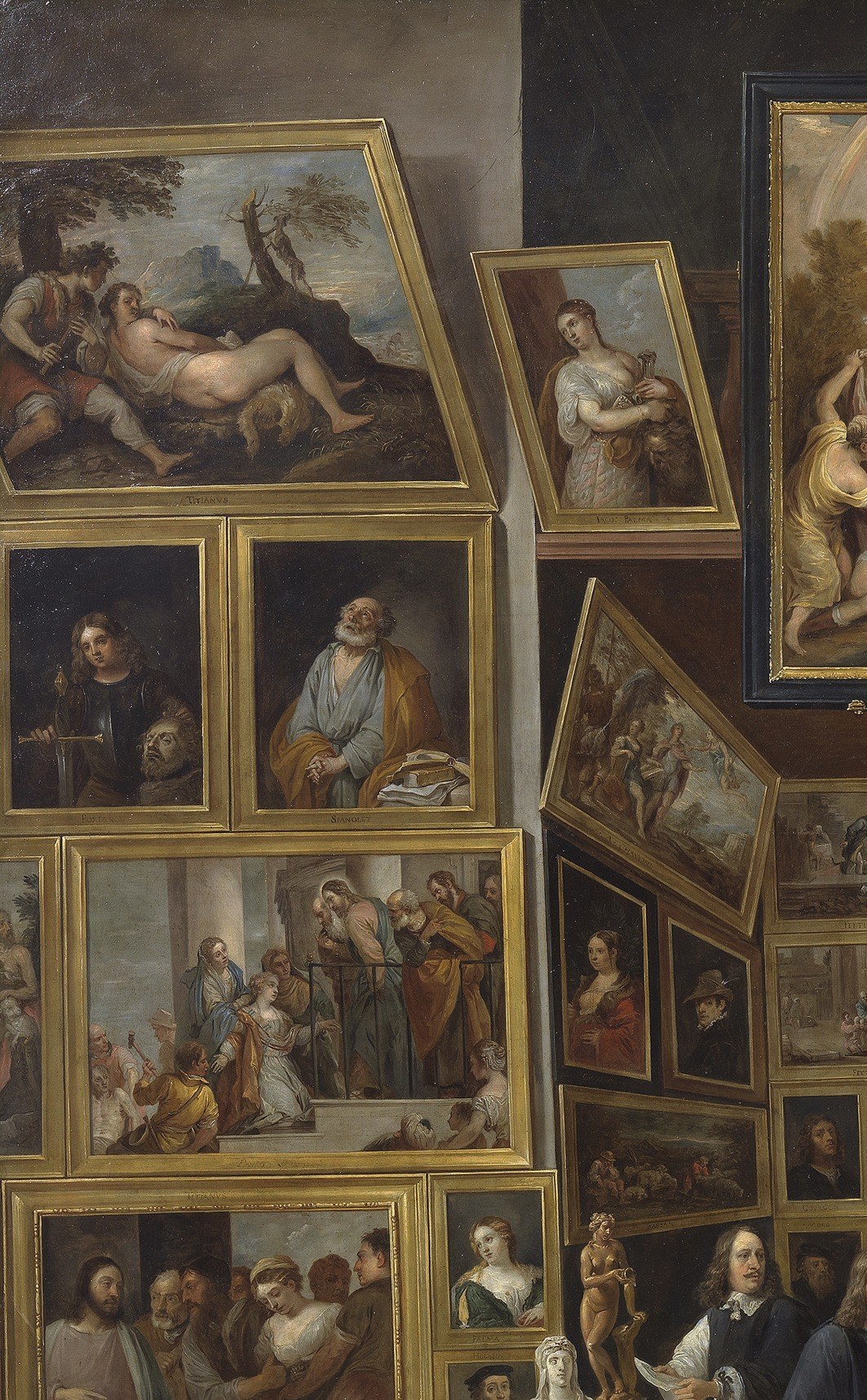 Includes portraits and figure scenes; the vertical stacking from floor to cornice shows the Baroque salon-hang convention.