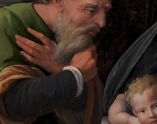 Nearby, Saint Joseph is deep in contemplation and prayer.