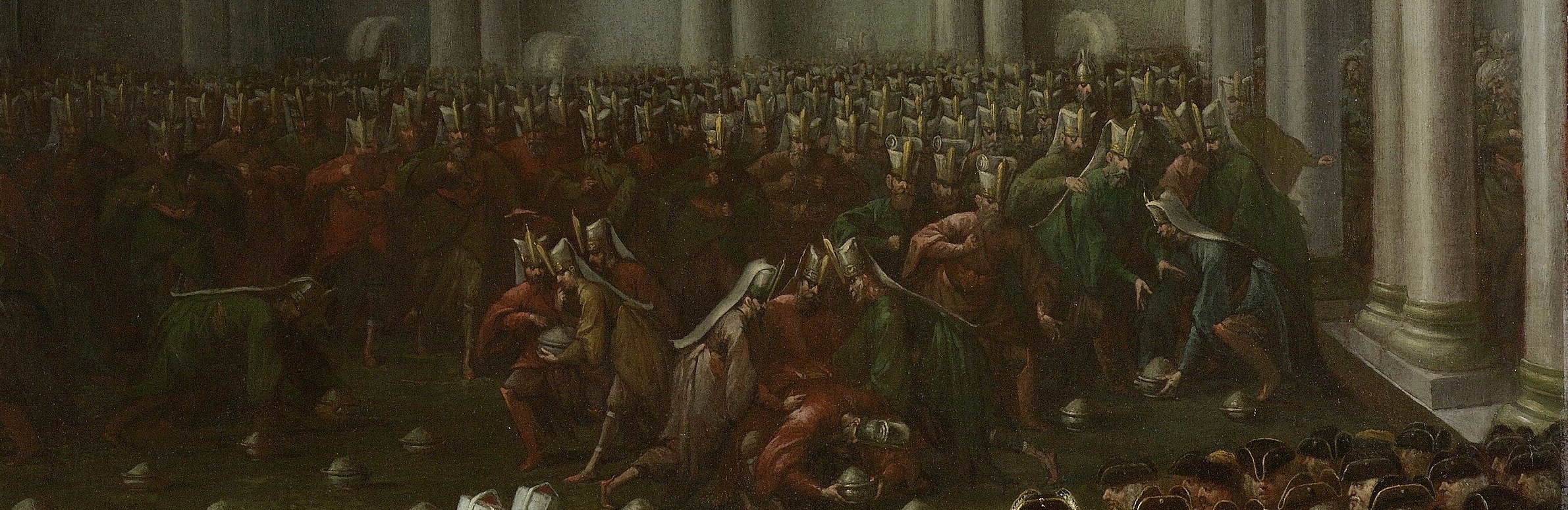 Rows of Ottoman soldiers line his path, in red uniforms.