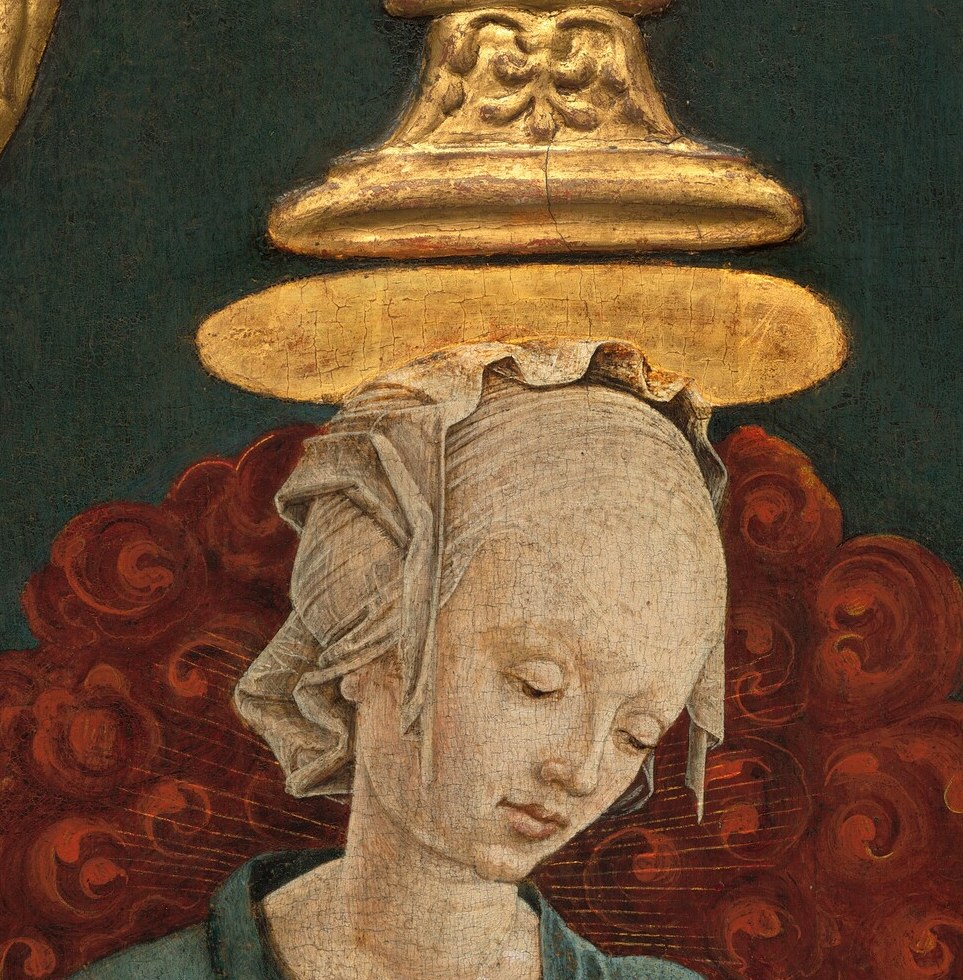 Tura's signature hard, almost mask-like features , the plucked high hairline marks fashionable Ferrarese court beauty and gives the face an otherworldly severity that distinguishes this Virgin from any Florentine counterpart.
