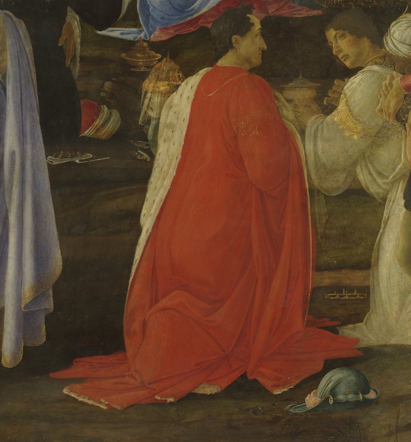 This man in red is likely the painting's patron, Gaspare del Lama.