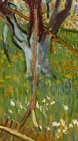 This tool suggests human presence and the activity of tending the orchard, grounding the scene.
