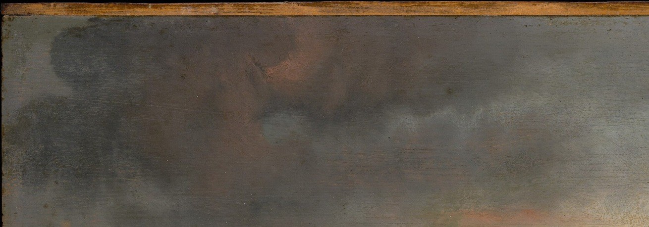 The heavy cloud bank pressing down from the left contrasts with the warm break on the right, creating a meteorological tension that dramatizes the cold.