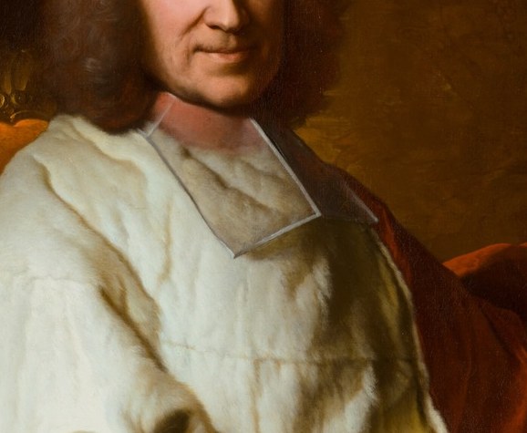 The crisp white fabric contrasts with his red robes, highlighting his dual role as clergyman and statesman.
