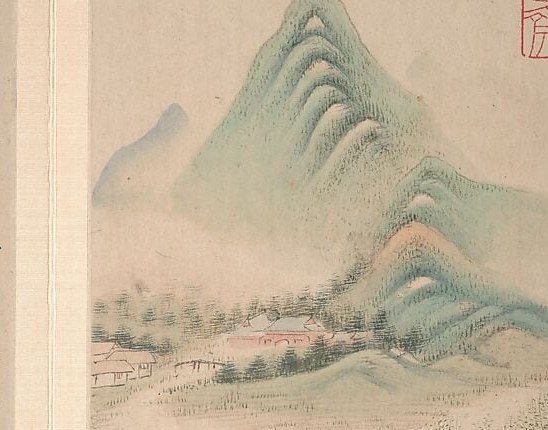 Look closely at the mist-shrouded mountain peaks.