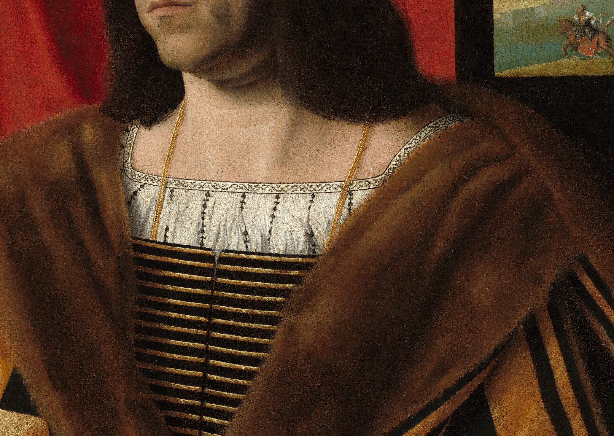 The alternating gold and black vertical stripes are precisely painted and indicate wealth; the fabric's sheen demonstrates Veneto's Leonardesque attention to textile rendering.