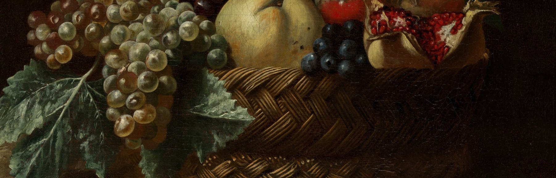 A woven basket, heavy with late-summer fruit.
