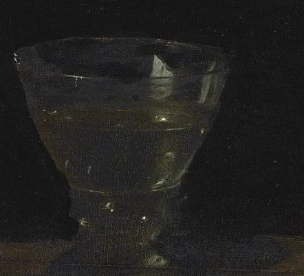 Look closely at the tall wine glass.