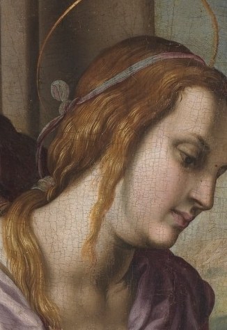 Mary and Joseph watch over the infant Jesus.