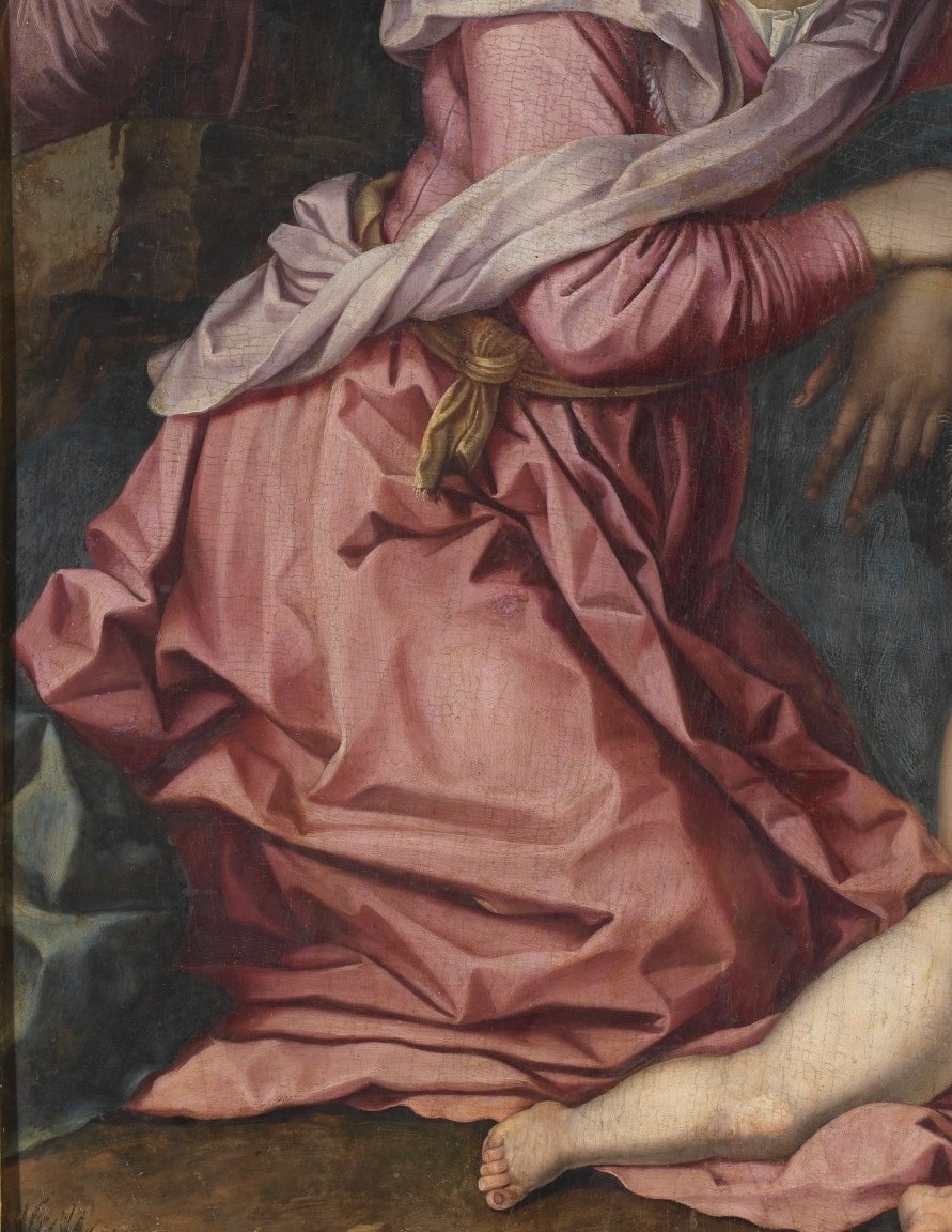 The rich folds and texture of the fabric create a sense of opulence and grace.