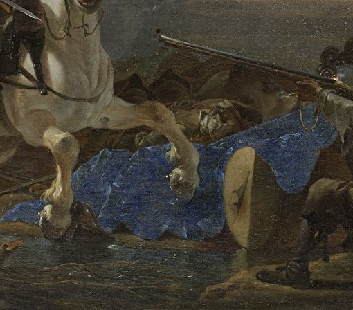A soldier falls from his horse.