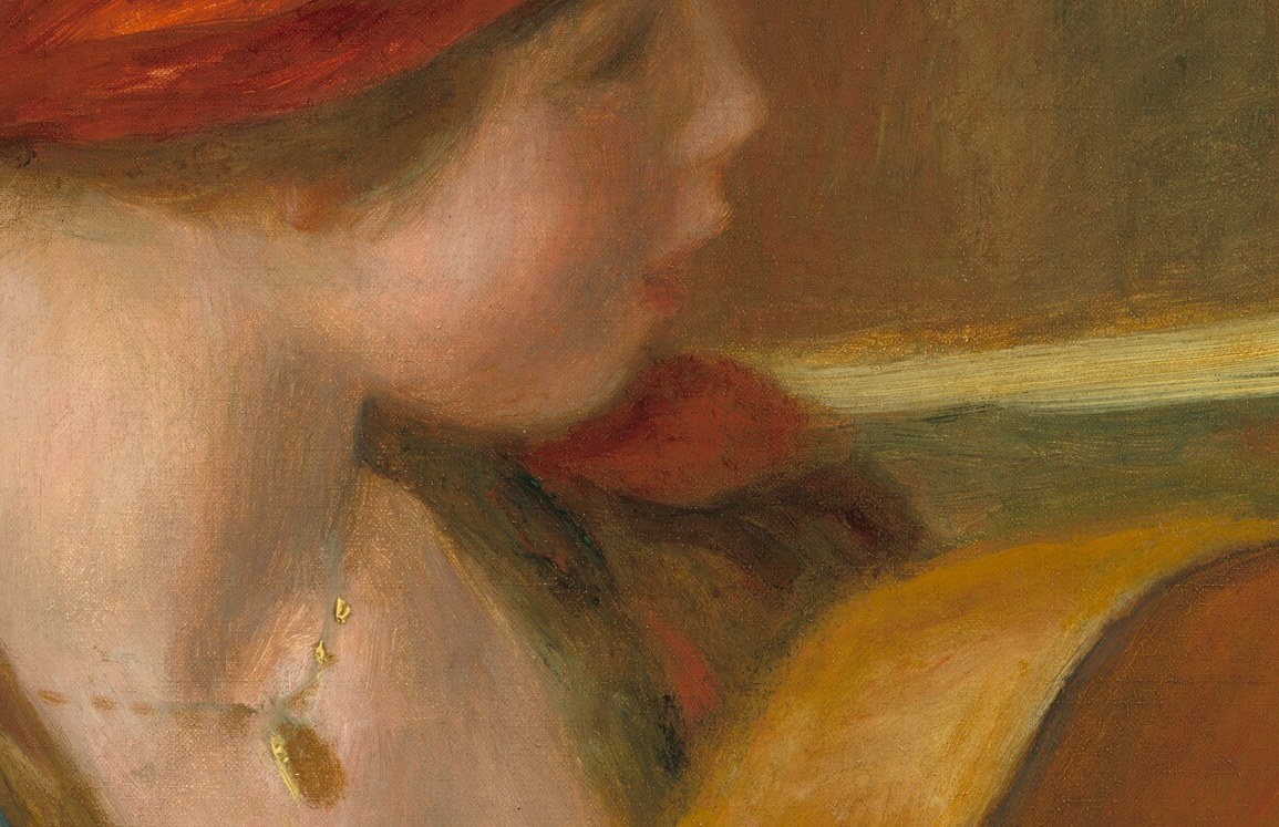 This woman sits inside that same year, playing.