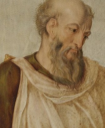 His gaze is directed downwards, suggesting contemplation or judgment, and his beard adds to his aged, wise appearance.