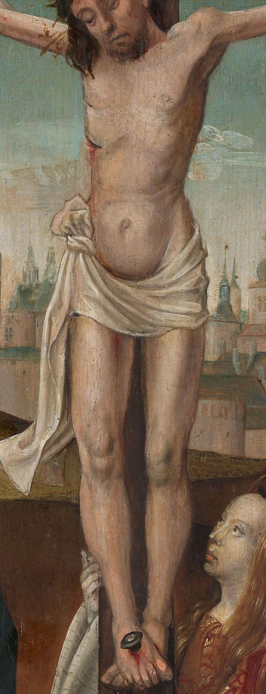 Look at the body on the cross.