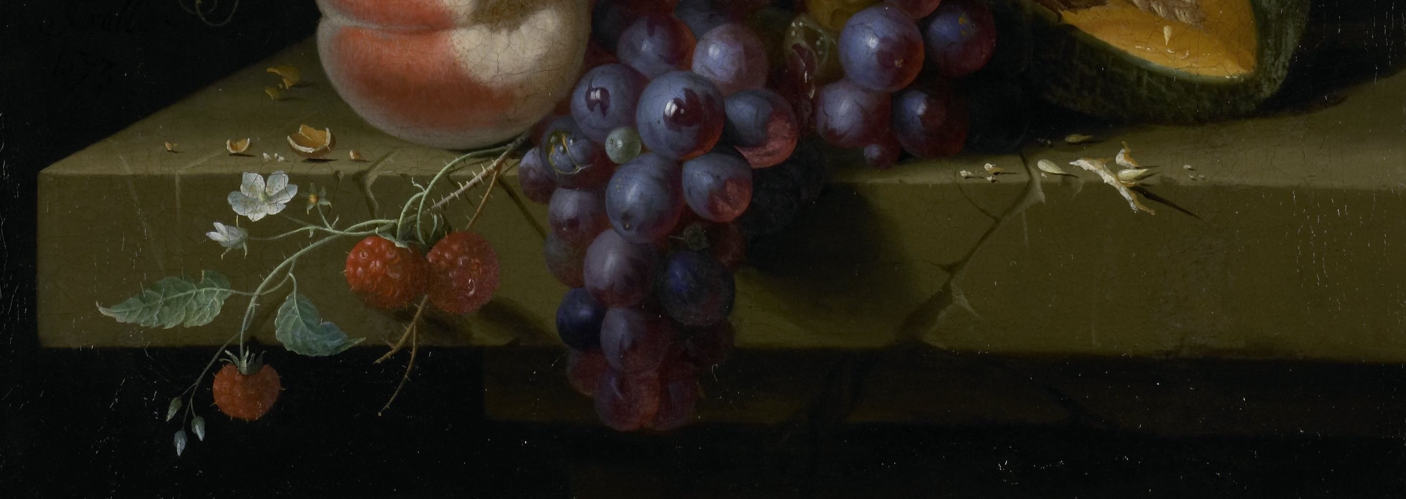 Its solid, muted surface grounds the arrangement and emphasizes the richness of the fruit.