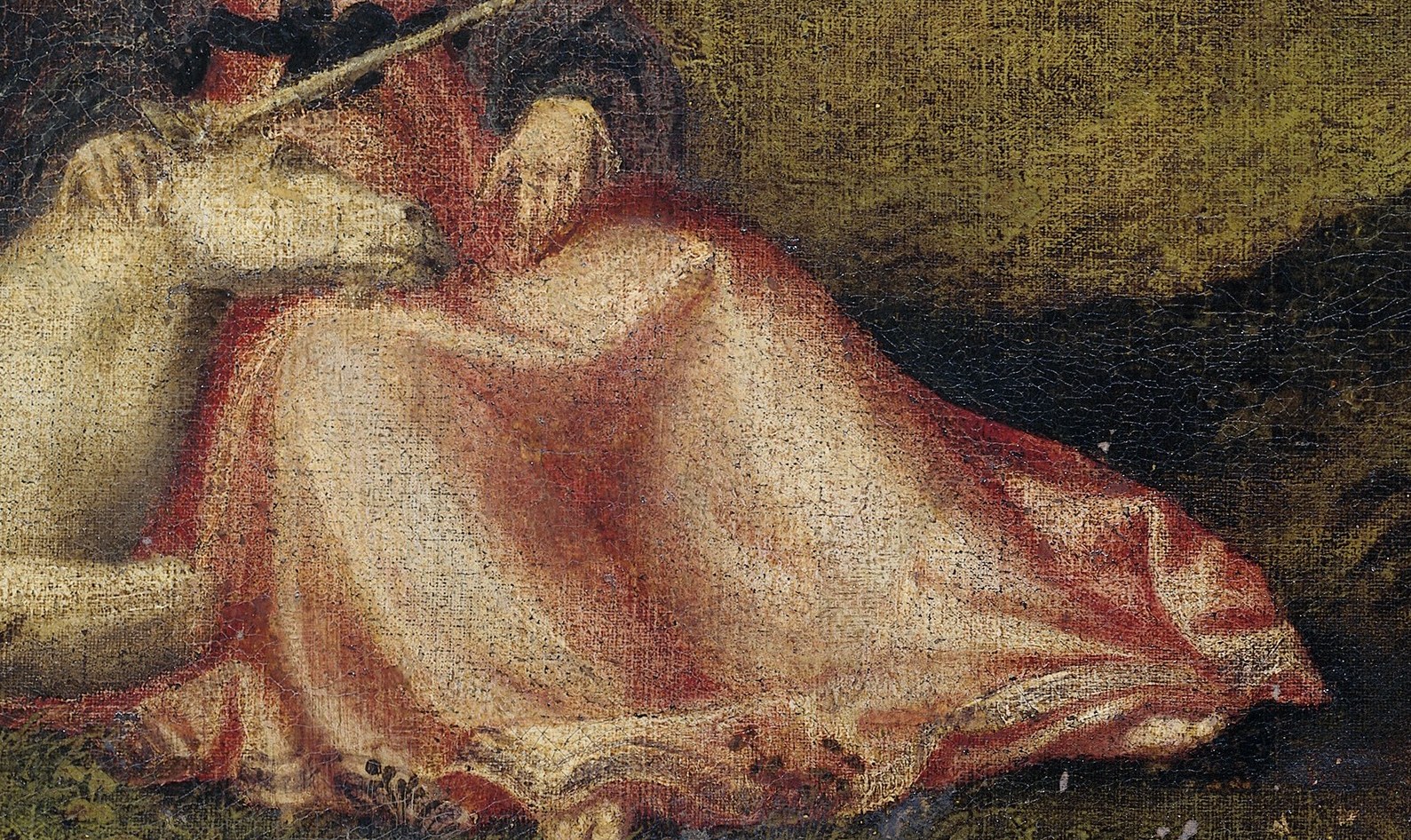 Her red dress, a rich Venetian color, suggests earthly beauty.