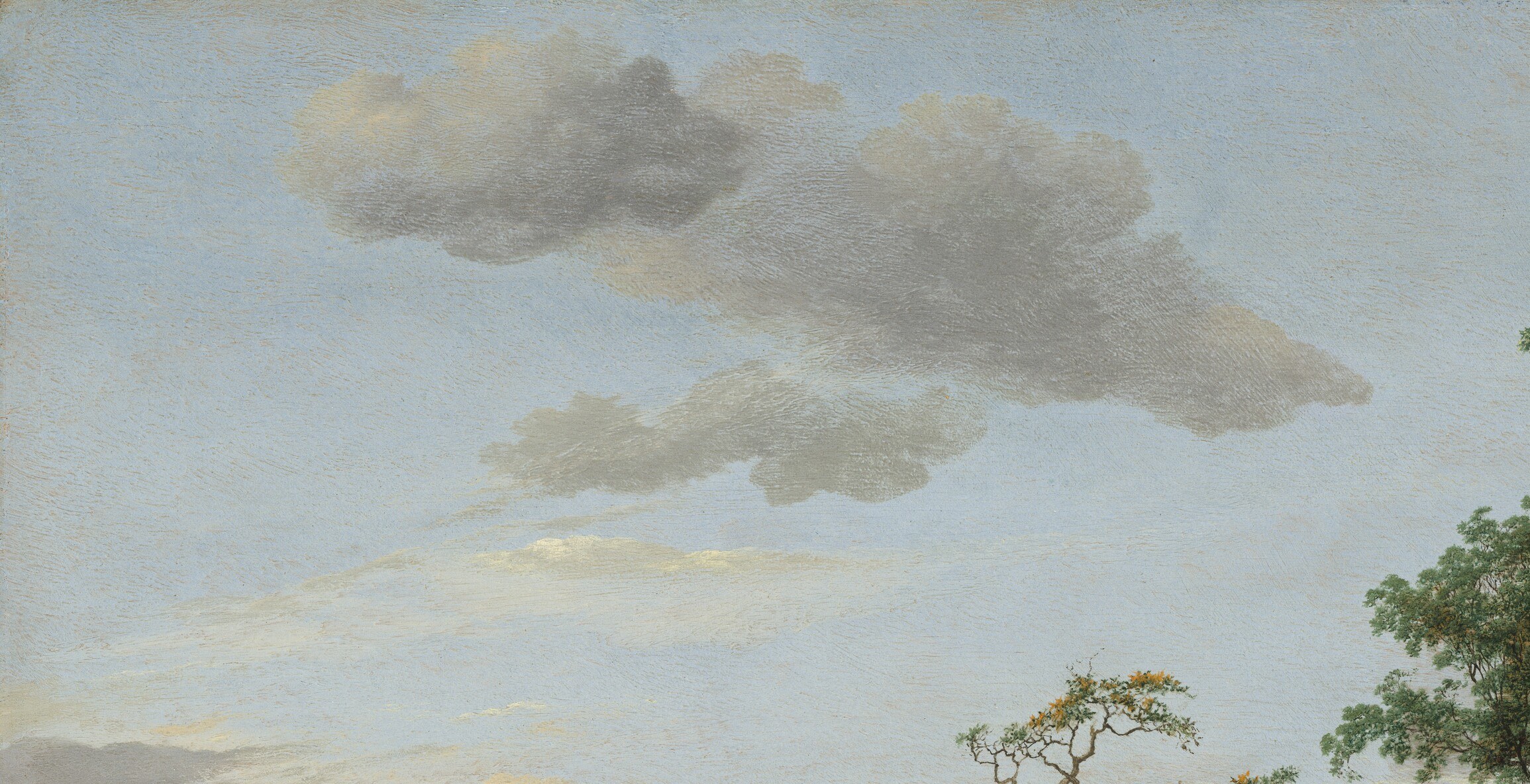 Tall cumulus clouds, lit from inside, a Dutch-sky signature.