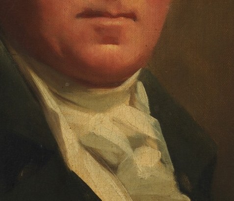 His crisp cravat hints at fine tailoring.