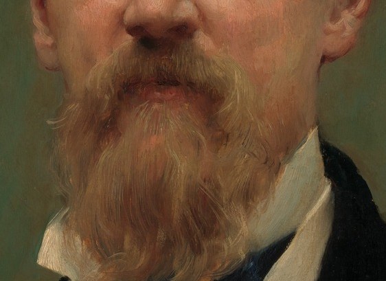 Notice his distinct red beard and mustache.