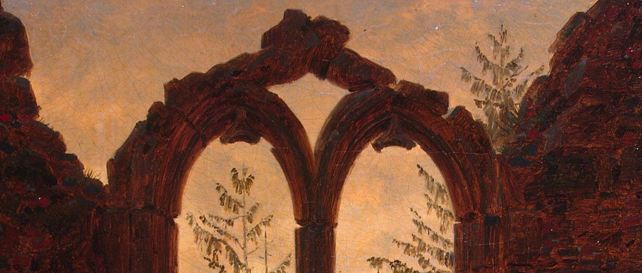Look at the crumbling Gothic tracery around him.