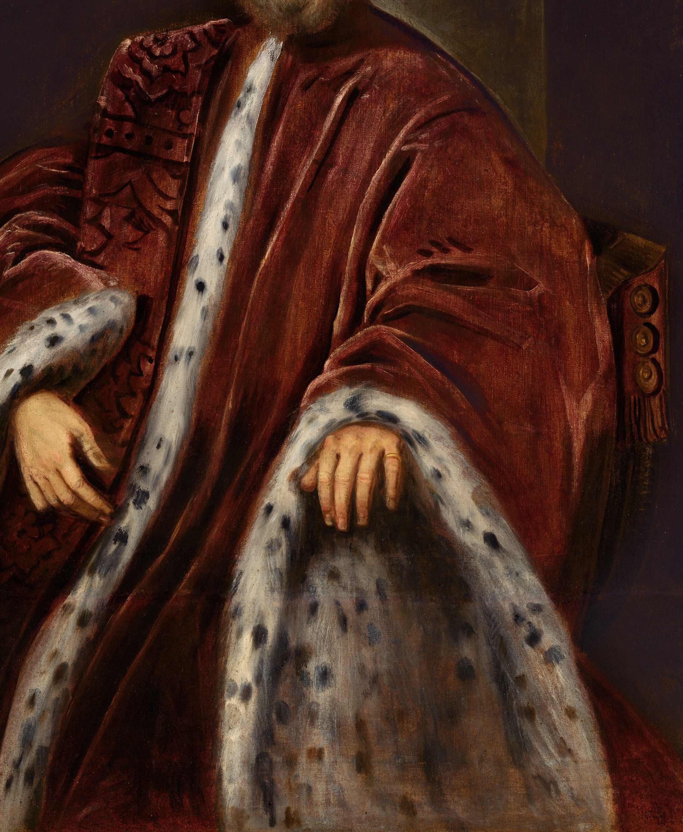 His rich red robe signals his wealth and status.