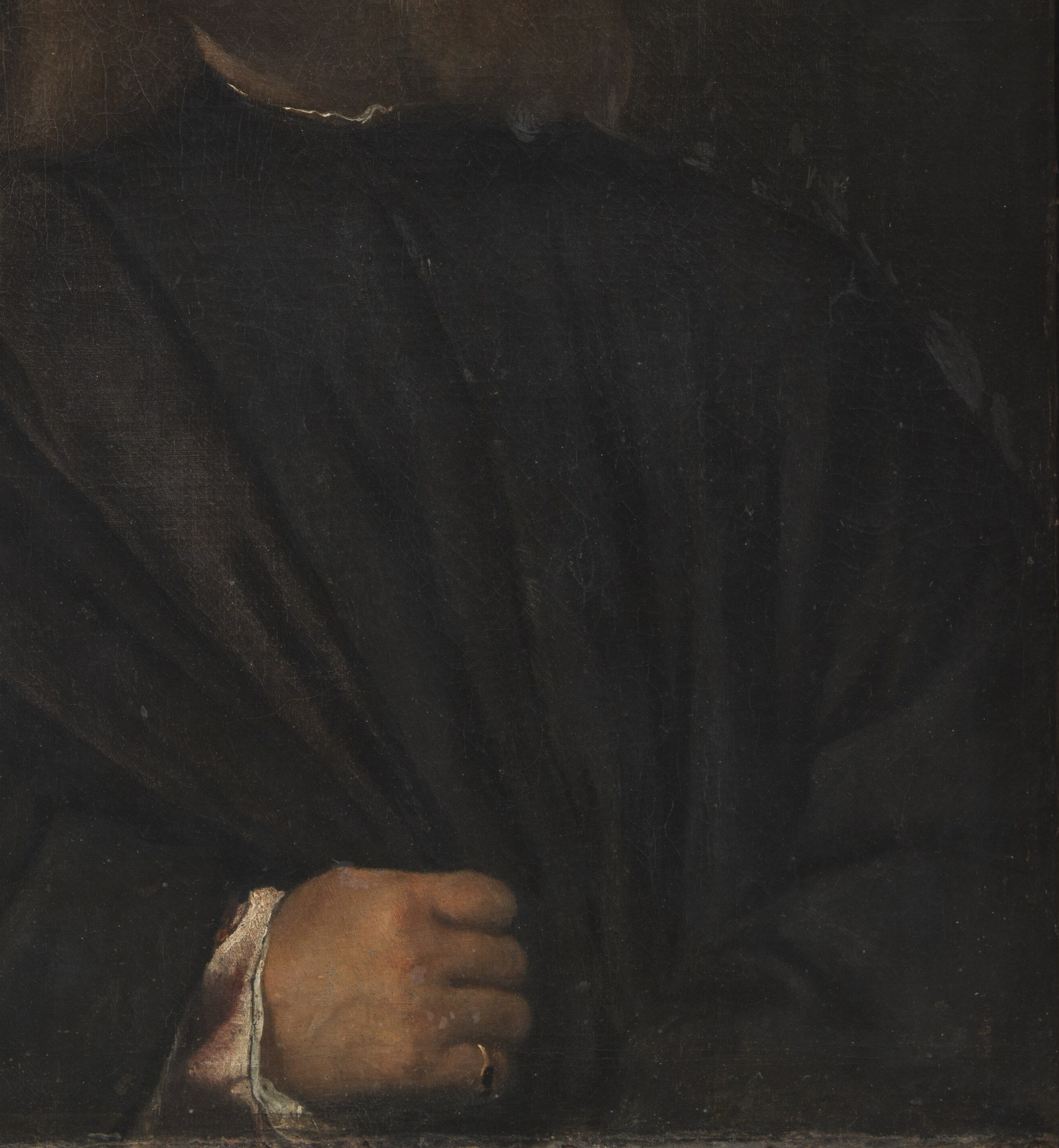 The voluminous, dark fabric of his cloak suggests his status and the somber mood of the portrait.