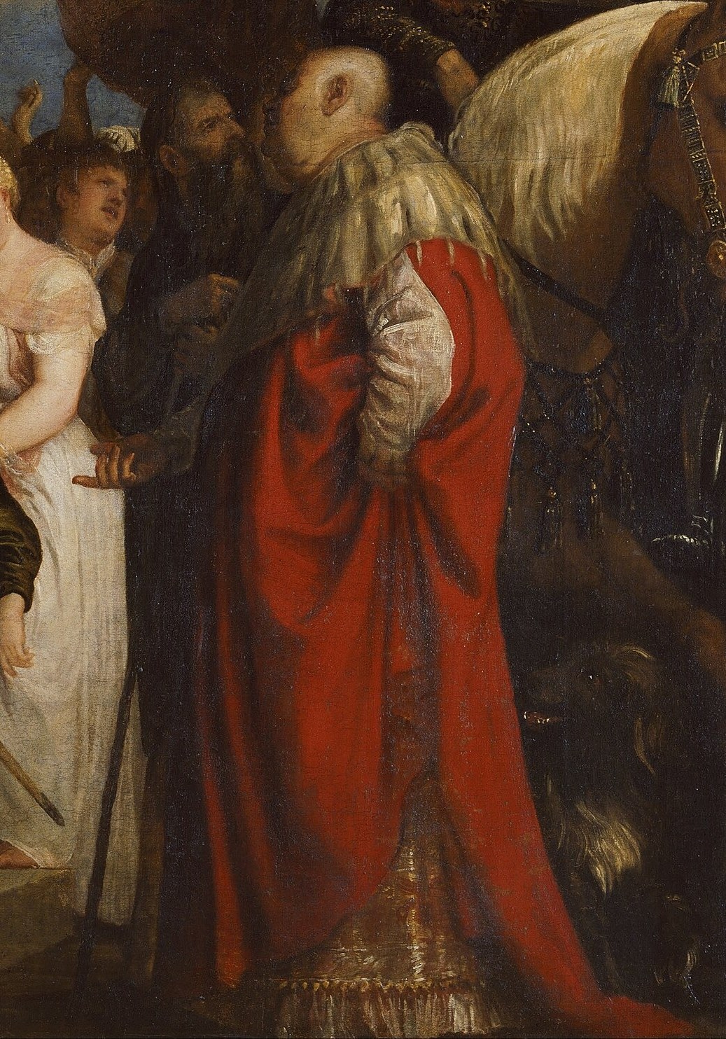 The opulent robe suggests high status and power, contrasting with Christ's suffering.