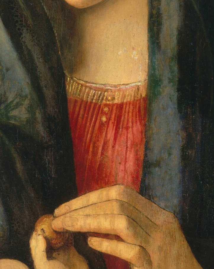 Her raised finger points to his heart.