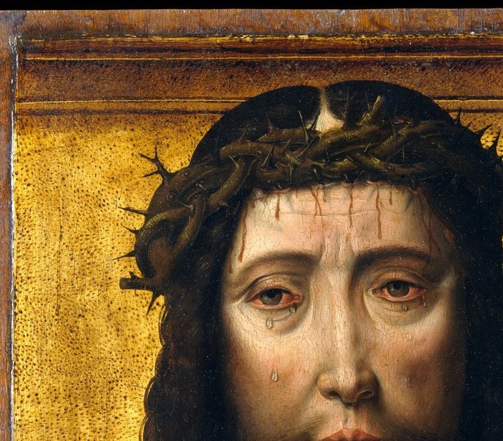 The crown of thorns sits low on the brow; tears track down the same cheeks as on the Virgin , the symmetry of suffering is the diptych's central argument